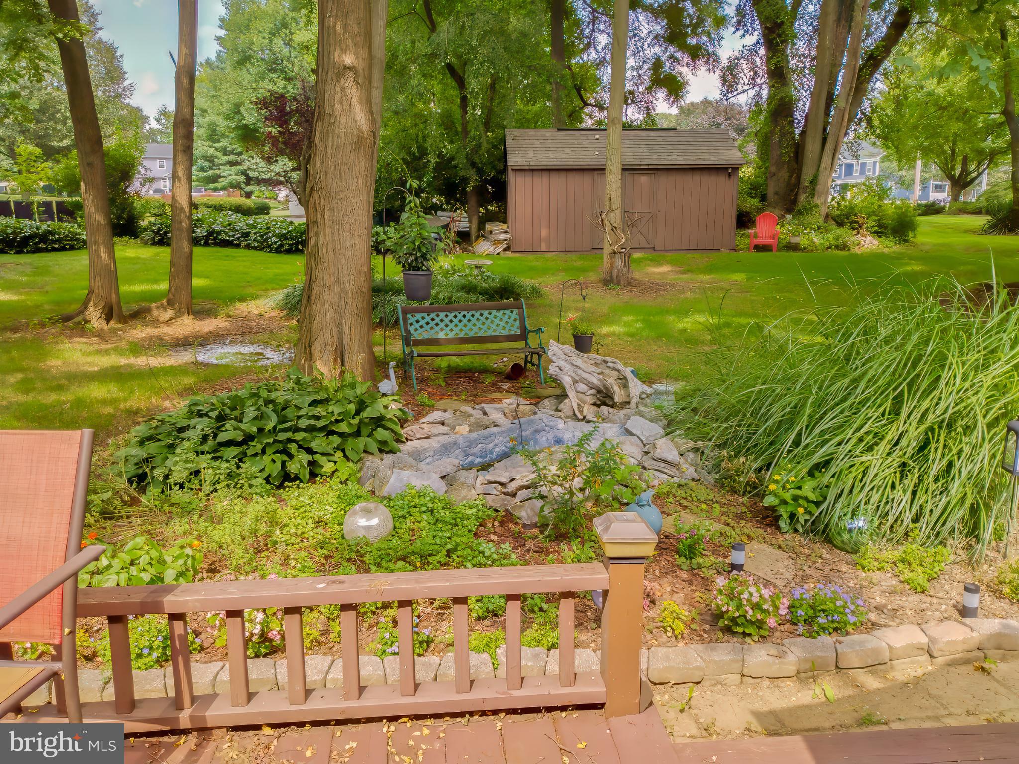 622 Shelley Court Lititz, PA 17543 - Photo 45 of 56 Serene garden retreat with lush greenery.