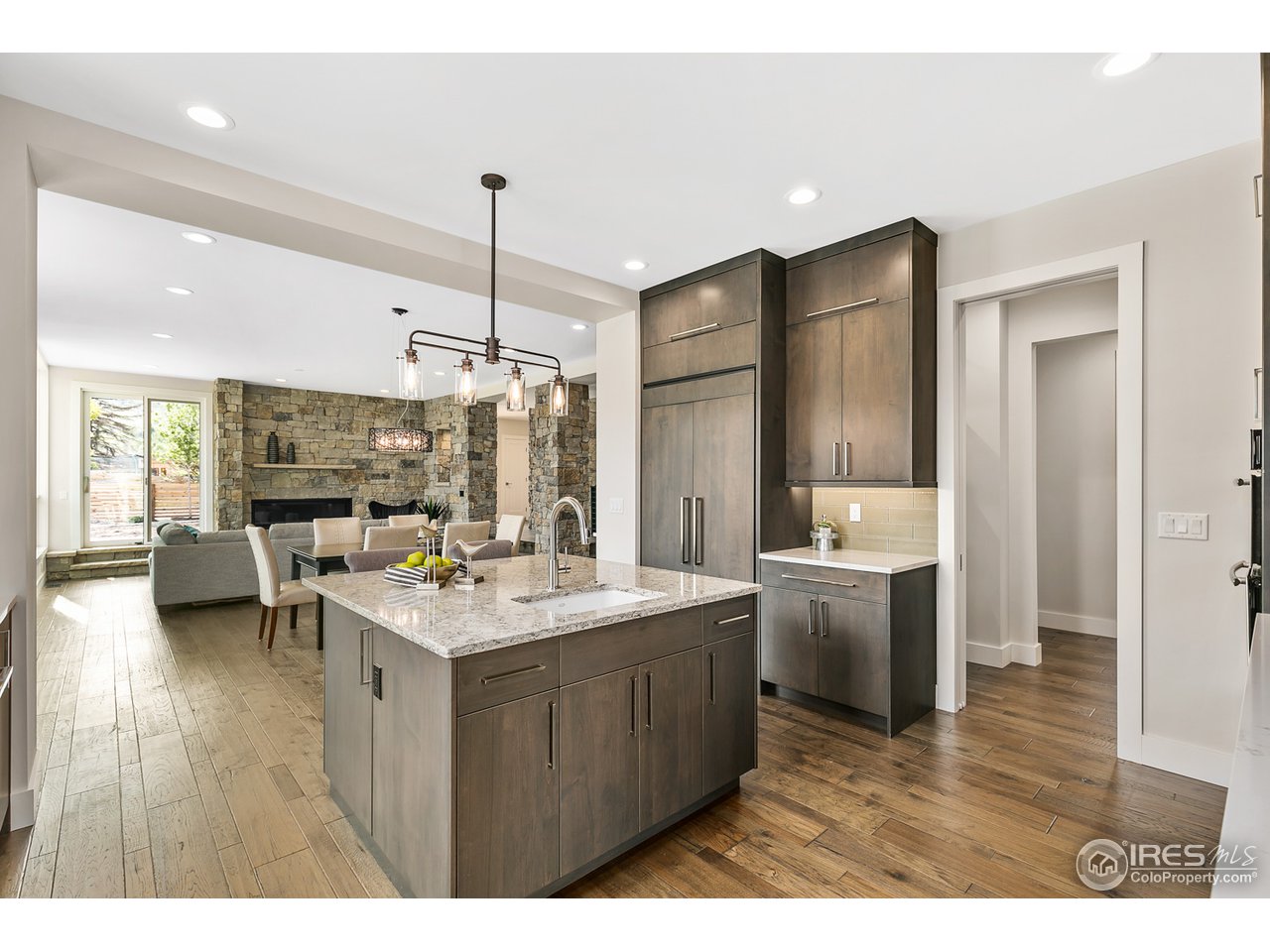 2800 10th Street Boulder, CO 80304 - Photo 14 of 40 a kitchen with a stove a refrigerator and a sink