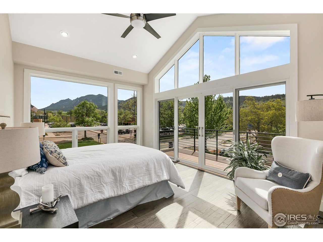 2800 10th Street Boulder, CO 80304 - Photo 22 of 40 a bed room with a bed and a large window