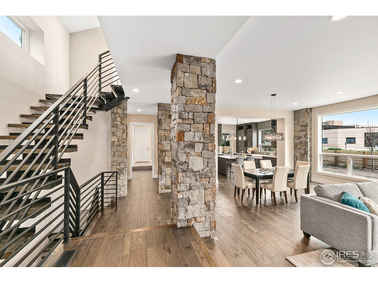 2800 10th Street Boulder, CO 80304 - Photo 3 of 40 a dining room with furniture and wooden floor