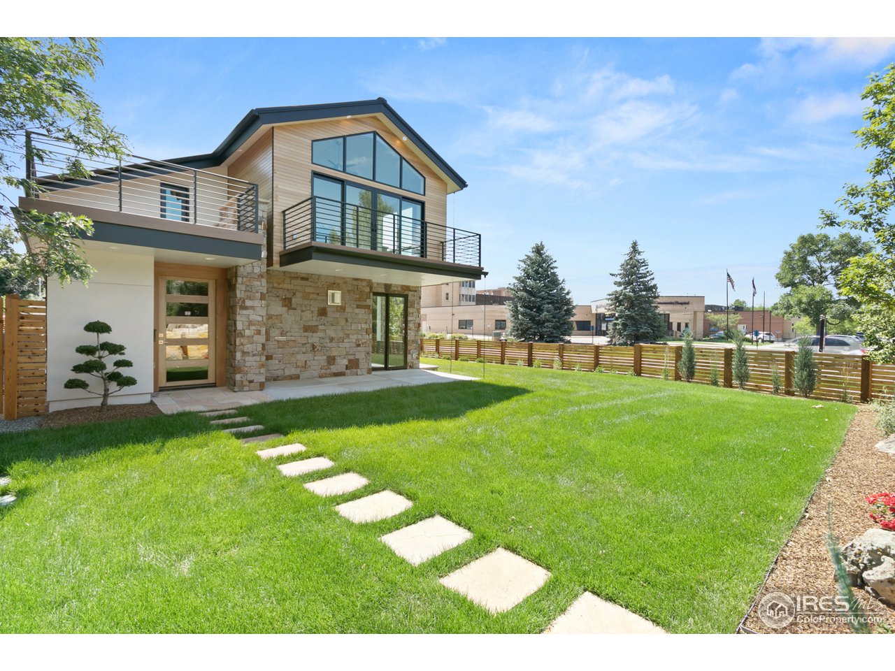 2800 10th Street Boulder, CO 80304 - Photo 38 of 40 a front view of a house with a yard