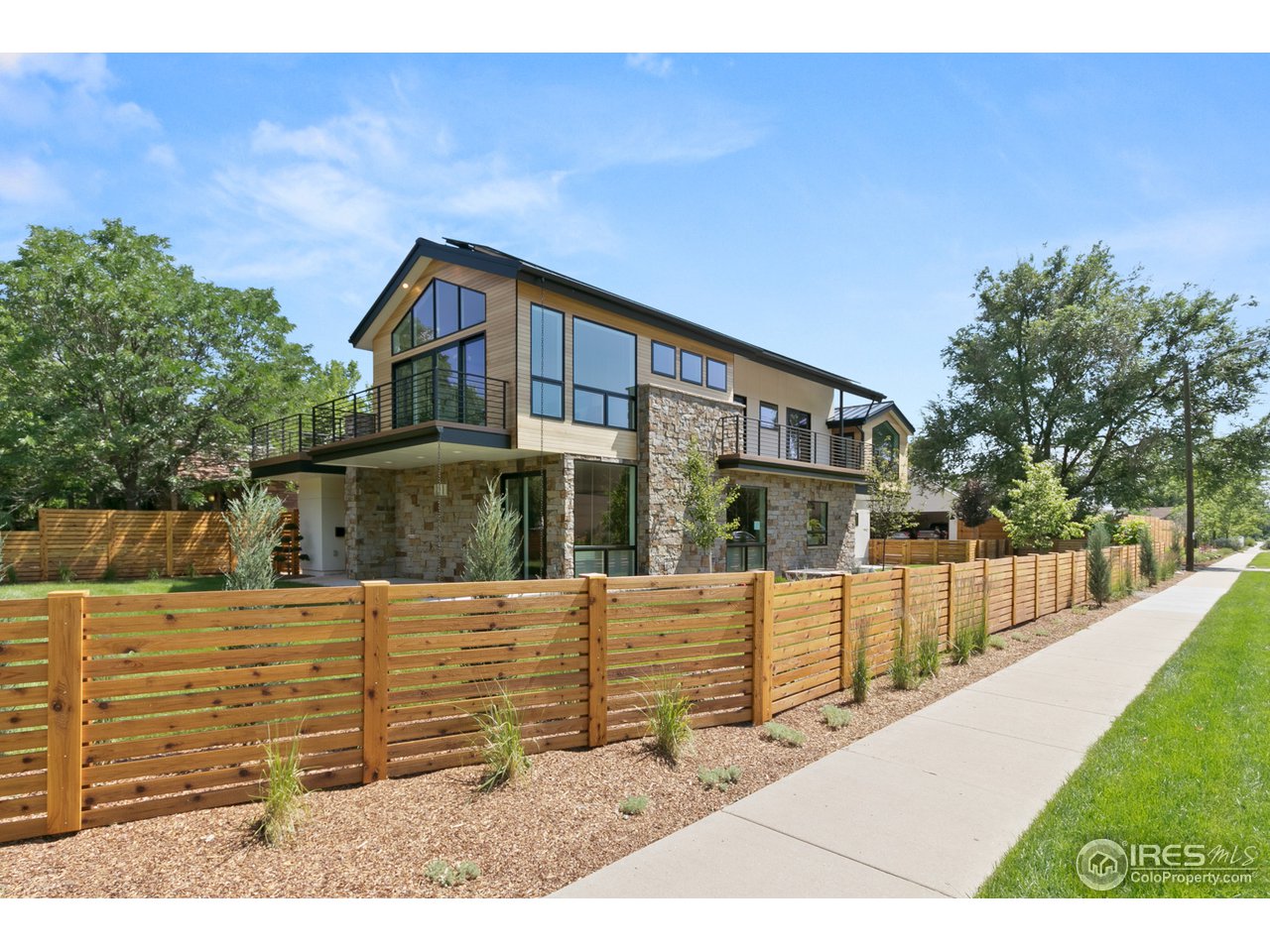 2800 10th Street Boulder, CO 80304 - Photo 39 of 40 a view of a house with a yard