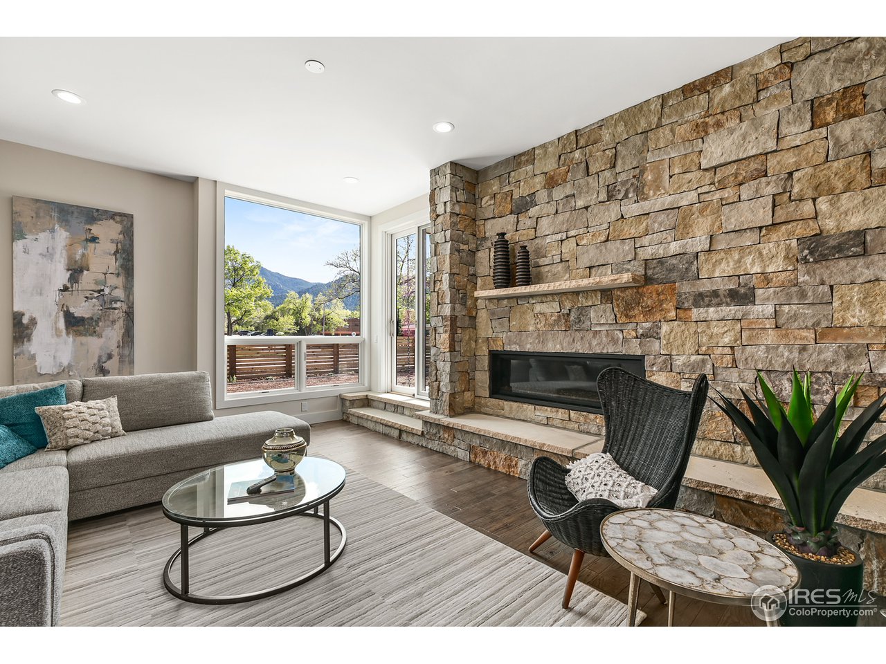 2800 10th Street Boulder, CO 80304 - Photo 4 of 40 a living room with furniture and a fireplace