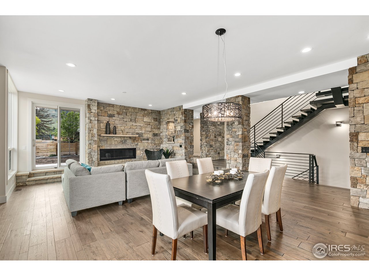 2800 10th Street Boulder, CO 80304 - Photo 10 of 40 a dining room with furniture and wooden floor