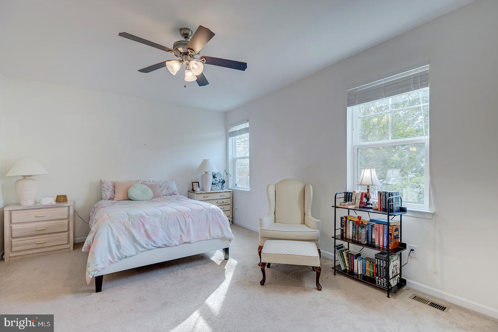 117 Carriage Drive Milton, DE 19968 - Photo 17 of 62 a bedroom with a bed and a large window