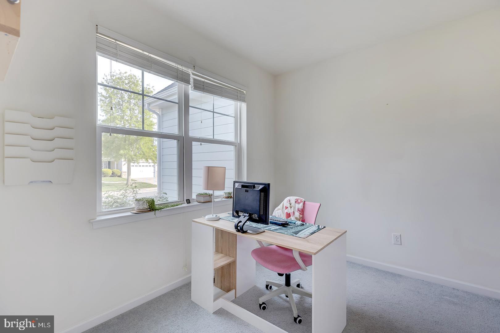 117 Carriage Drive Milton, DE 19968 - Photo 22 of 62 a living room with furniture and a window