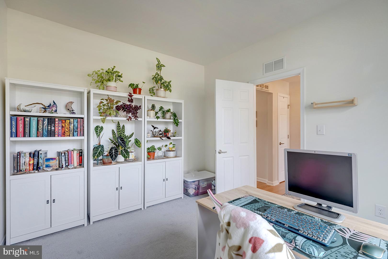 117 Carriage Drive Milton, DE 19968 - Photo 28 of 62 a bedroom with furniture and book shelf