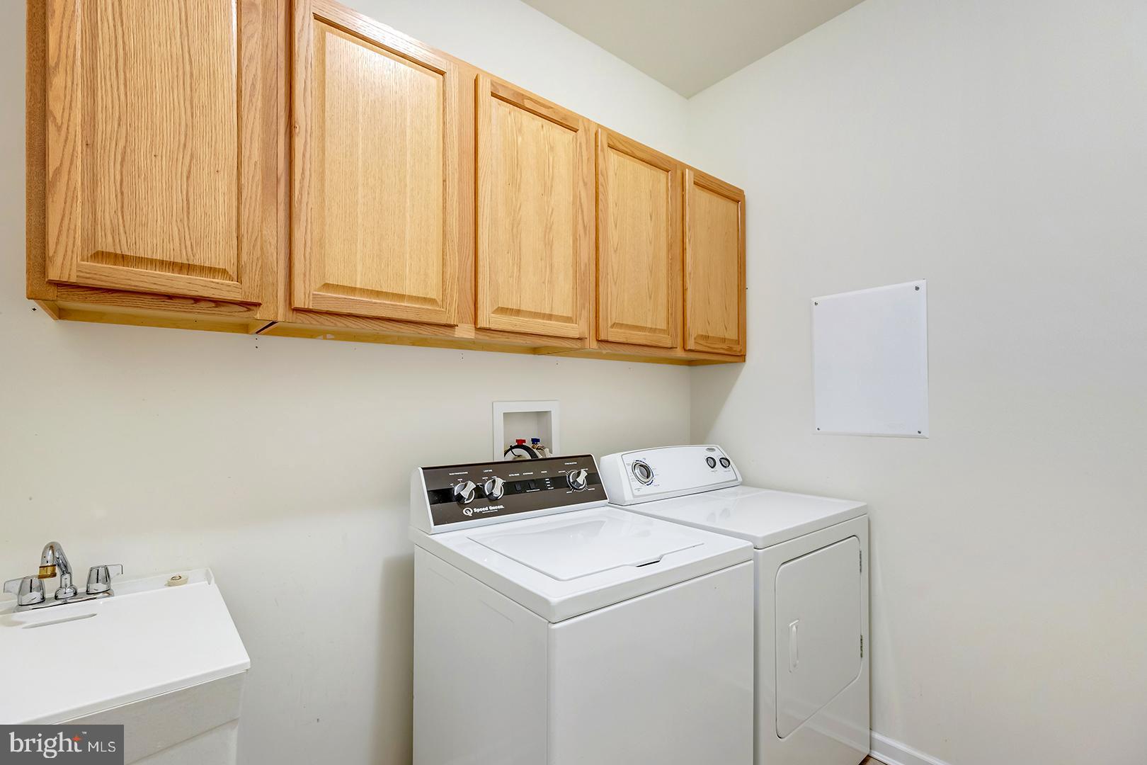 117 Carriage Drive Milton, DE 19968 - Photo 32 of 62 a utility room with dryer and washer
