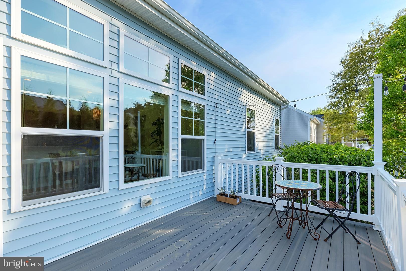 117 Carriage Drive Milton, DE 19968 - Photo 35 of 62 a view of a chair and table in the balcony