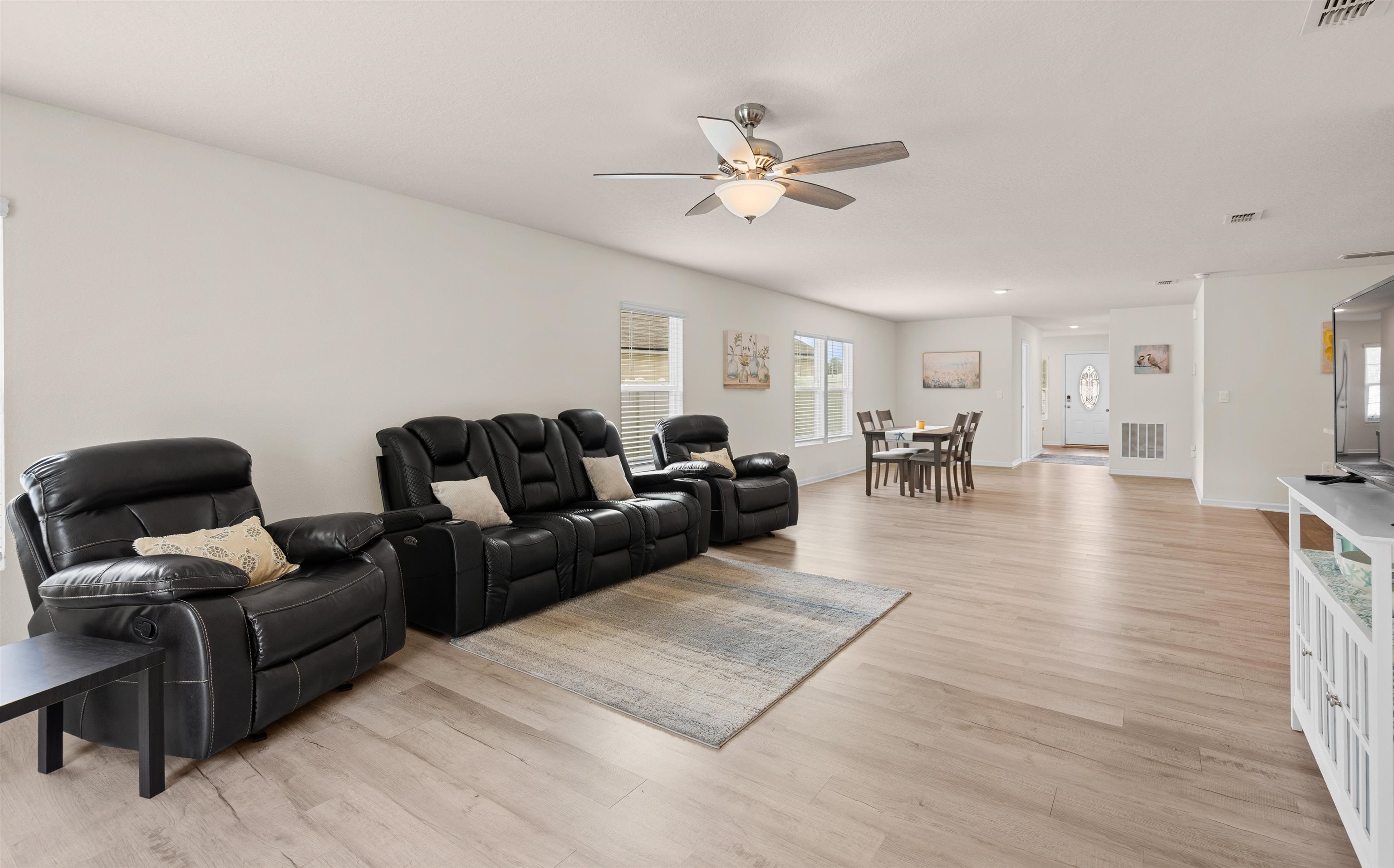 154 Falcon Ridge Road St. Augustine, FL 32084 - Photo 11 of 38 a living room with furniture and view of kitchen
