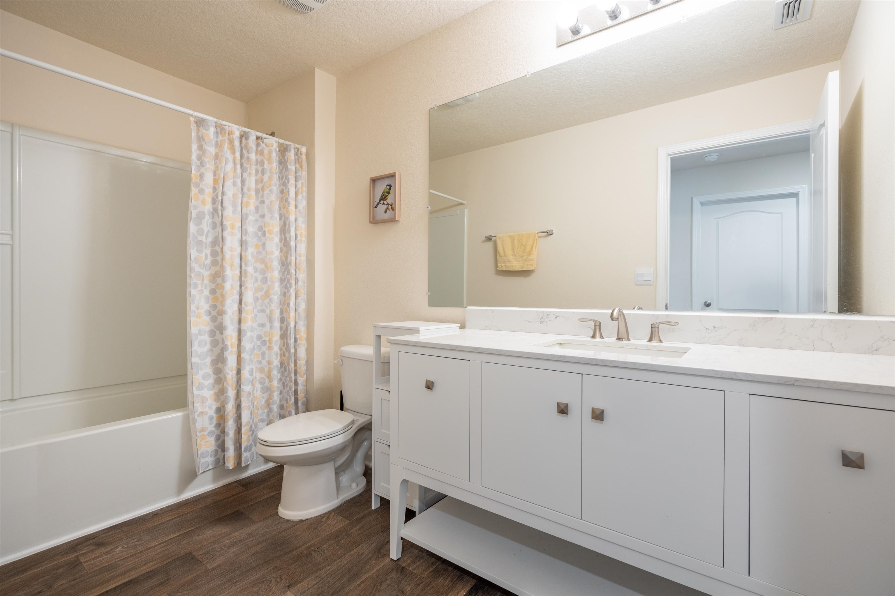 154 Falcon Ridge Road St. Augustine, FL 32084 - Photo 21 of 38 a bathroom with a sink toilet and shower