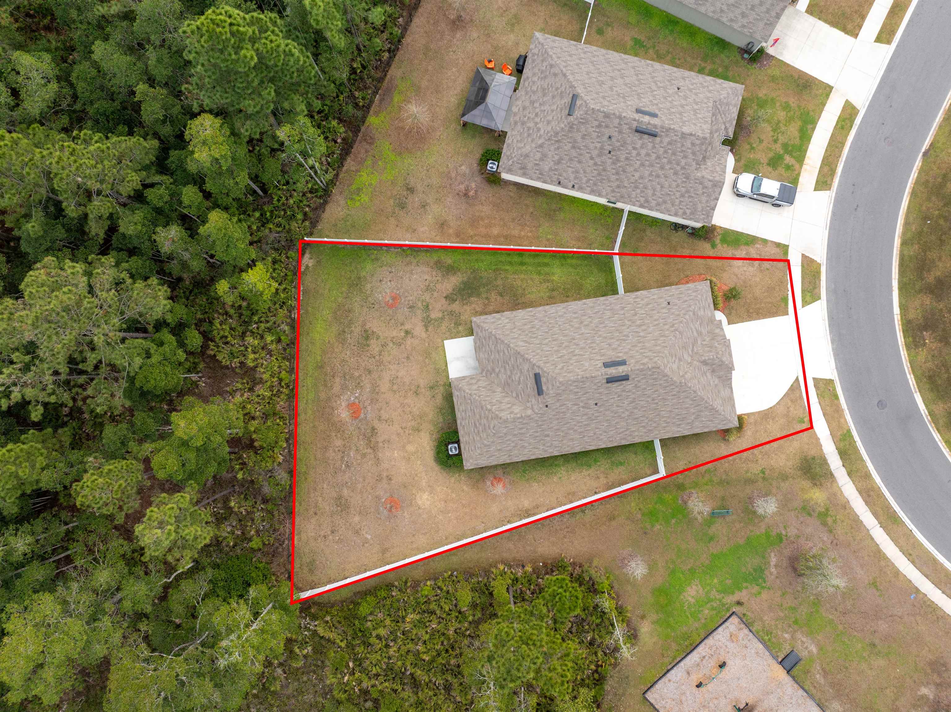 154 Falcon Ridge Road St. Augustine, FL 32084 - Photo 35 of 38 an aerial view of a house with a yard