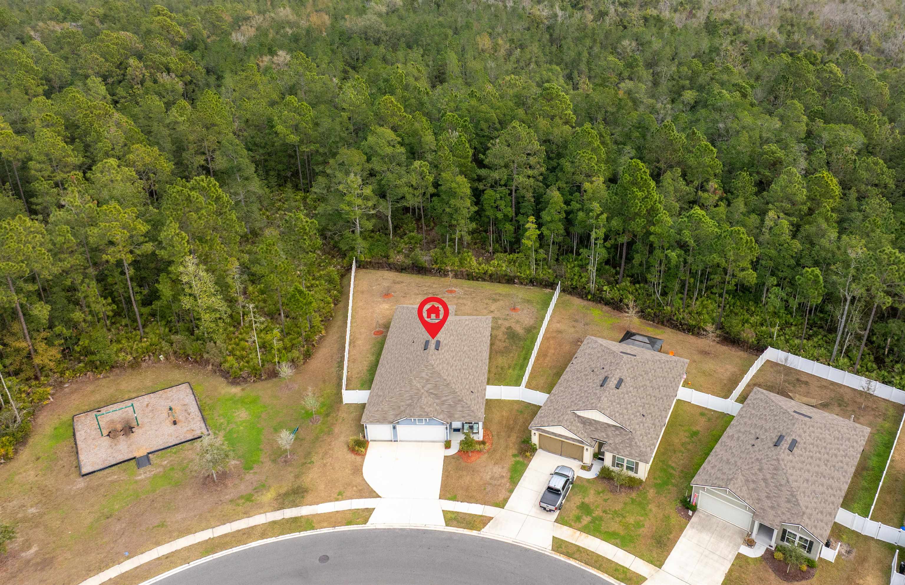 154 Falcon Ridge Road St. Augustine, FL 32084 - Photo 36 of 38 an aerial view of a couch with table and chairs