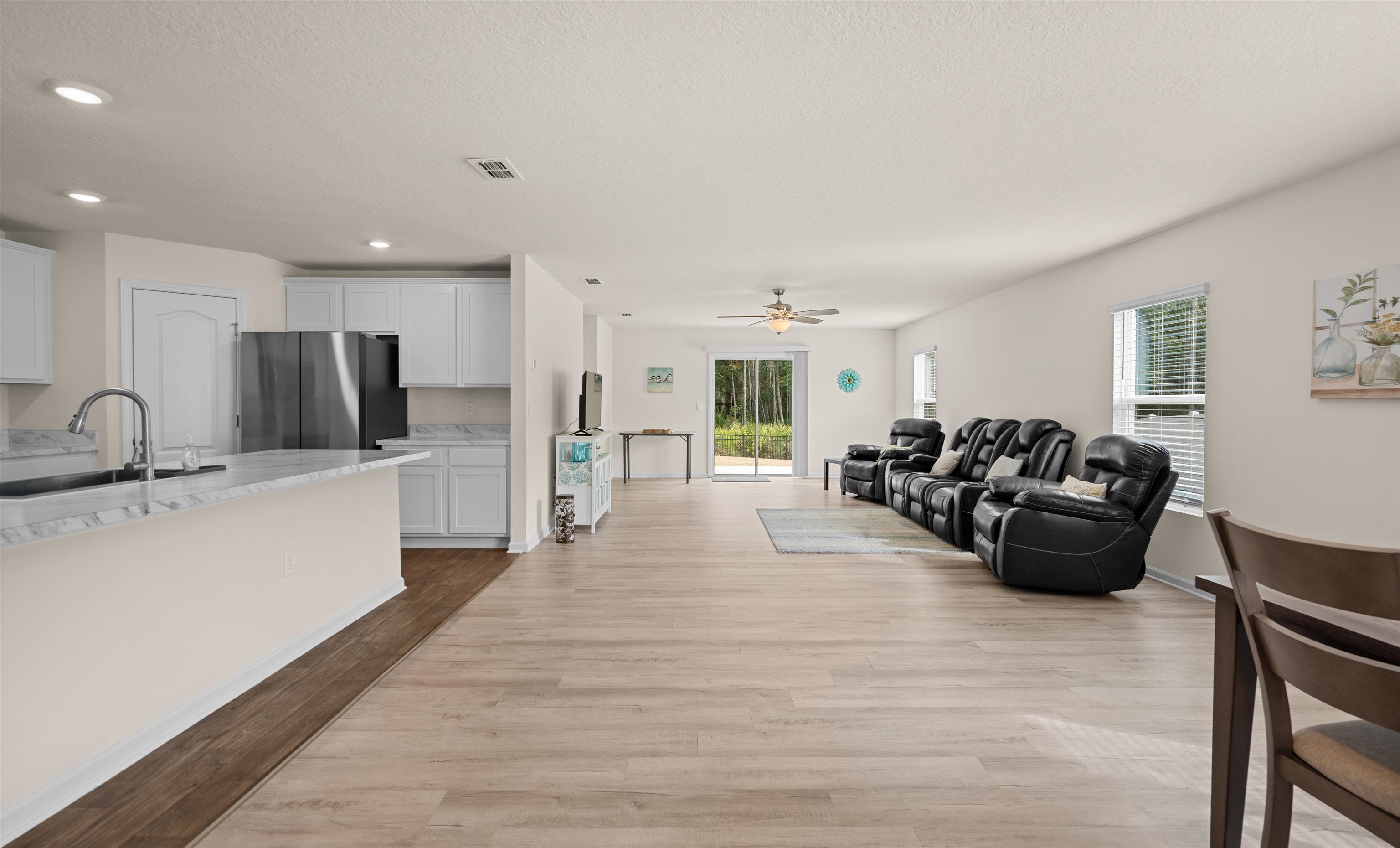 154 Falcon Ridge Road St. Augustine, FL 32084 - Photo 4 of 38 a large room with a lot of counter space