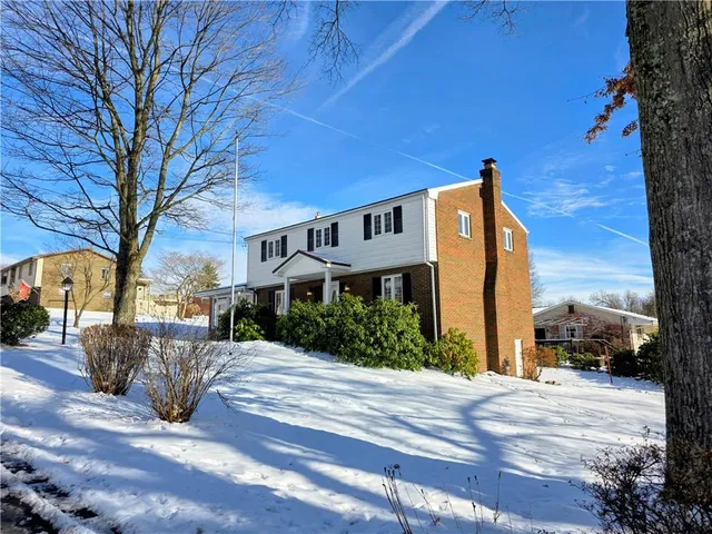 a view of a street with houses