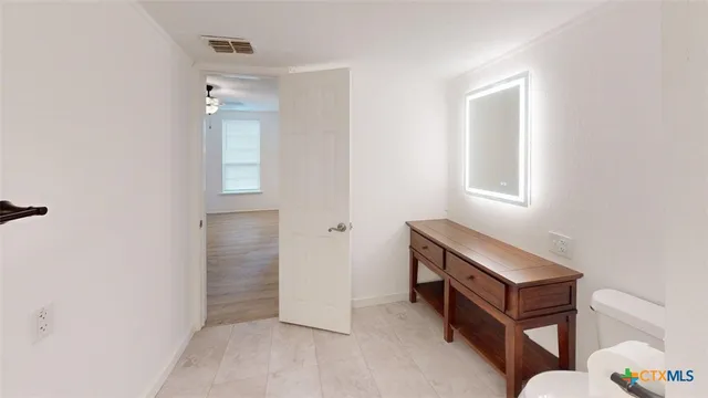 a room with furniture and a window