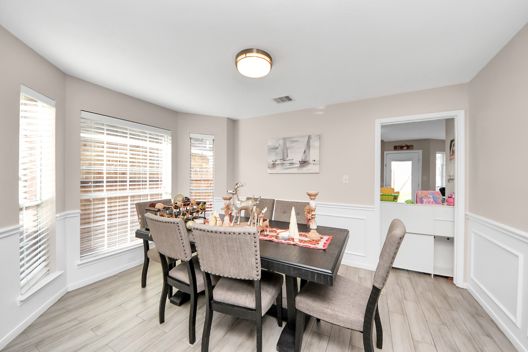 515 Spindle Ridge Drive Spring, TX 77386 - Photo 16 of 47 a view of a dining room with furniture and wooden floor