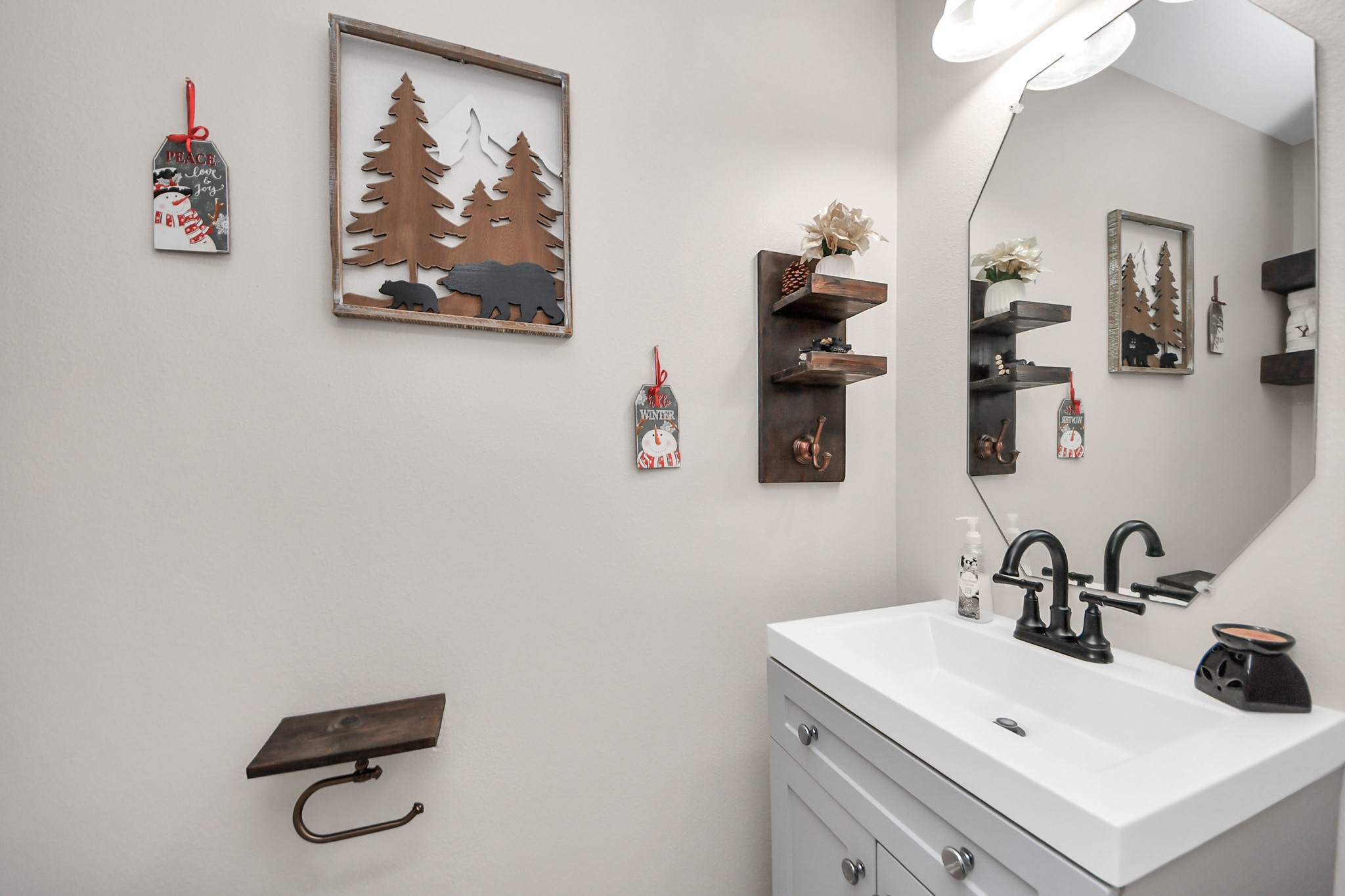 515 Spindle Ridge Drive Spring, TX 77386 - Photo 19 of 47 a bathroom with a sink mirror and vanity
