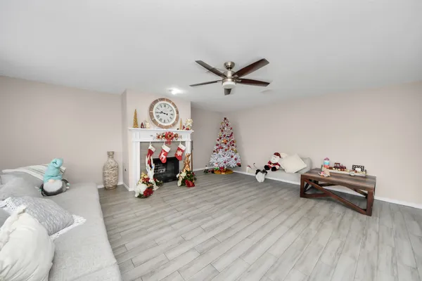 a view of livingroom with furniture and wooden floor