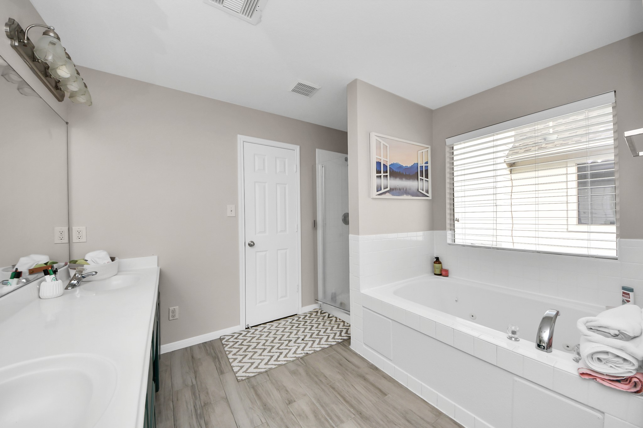 515 Spindle Ridge Drive Spring, TX 77386 - Photo 41 of 47 a bathroom with a bathtub and a sink
