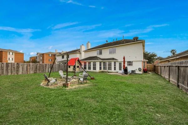 a view of a garden with a slide