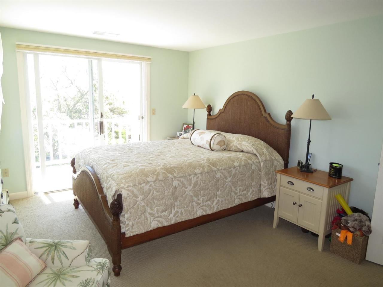 40 Wadsworth Road Chatham, MA 02659 - Photo 11 of 25 a bedroom with a bed and a window