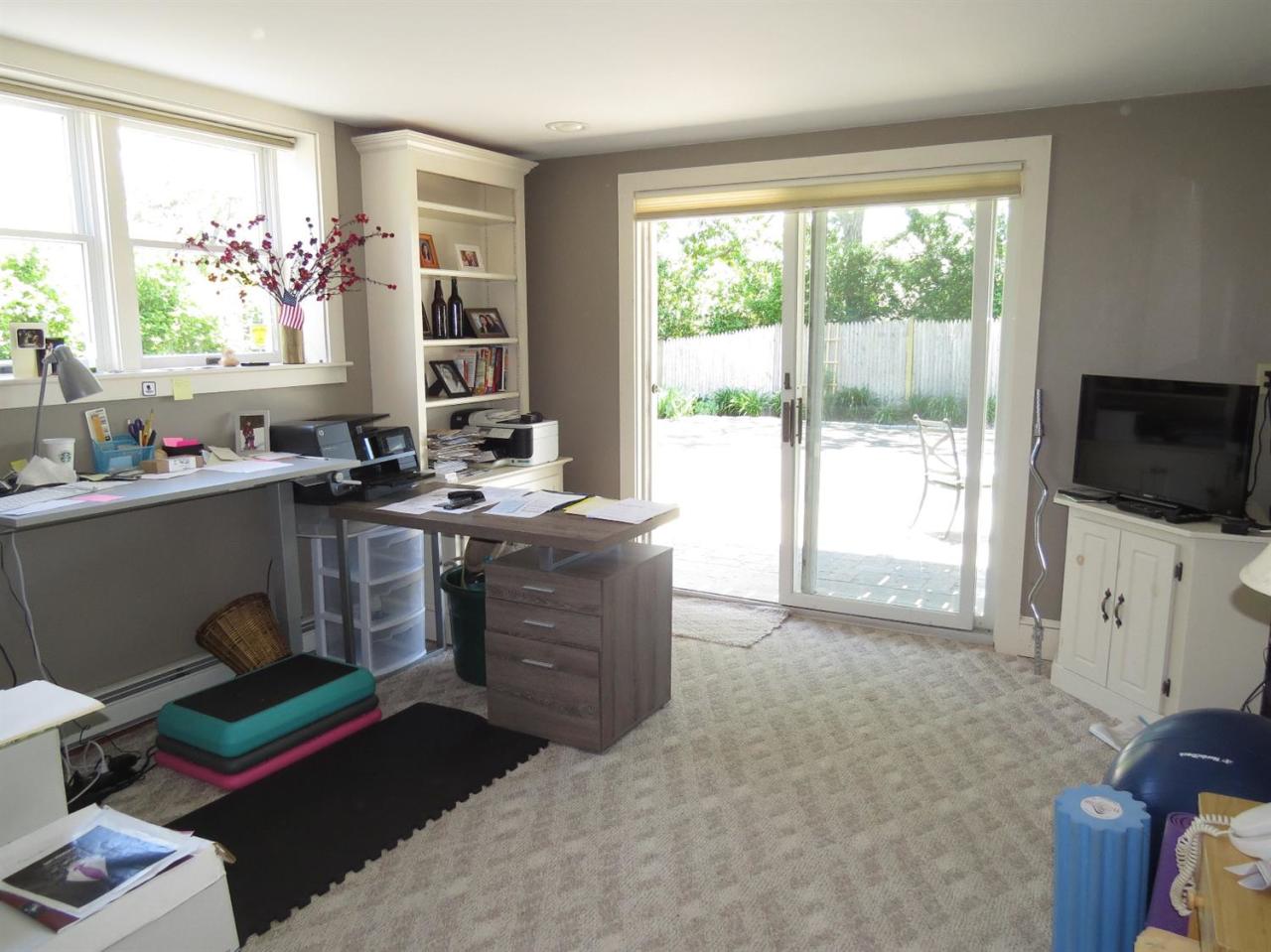 40 Wadsworth Road Chatham, MA 02659 - Photo 15 of 25 a living room with furniture and a flat screen tv