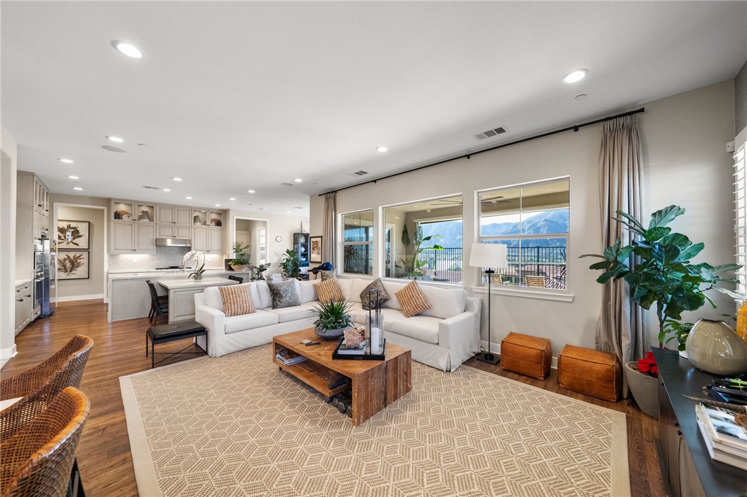 11463 Explorer Court Temescal Valley, CA 92883 - Photo 13 of 59 a living room with furniture and a large window