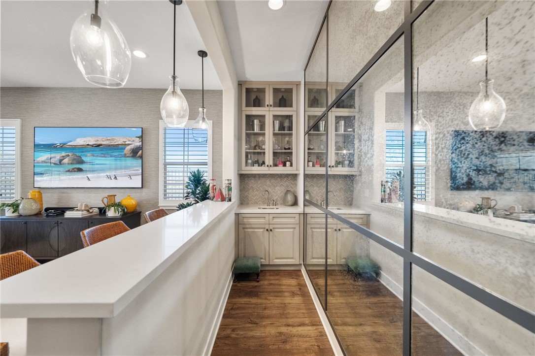 11463 Explorer Court Temescal Valley, CA 92883 - Photo 16 of 59 a large white kitchen with a large window