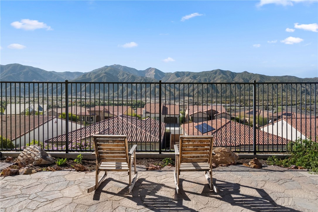 11463 Explorer Court Temescal Valley, CA 92883 - Photo 46 of 59 a view of a chair and table in the balcony