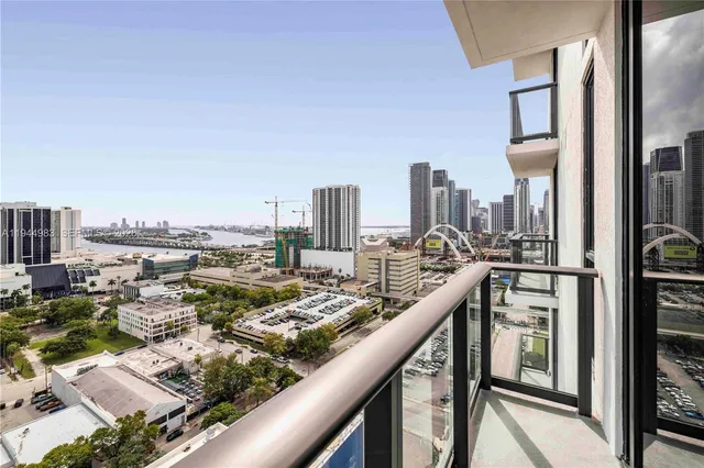 a swimming pool with outdoor seating