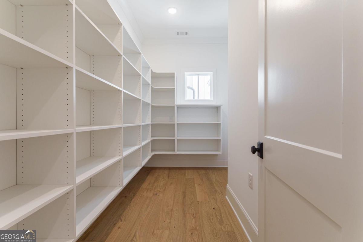 140 Parkside Lane Eatonton, GA 31024 - Photo 13 of 37 a view of a walk in closet