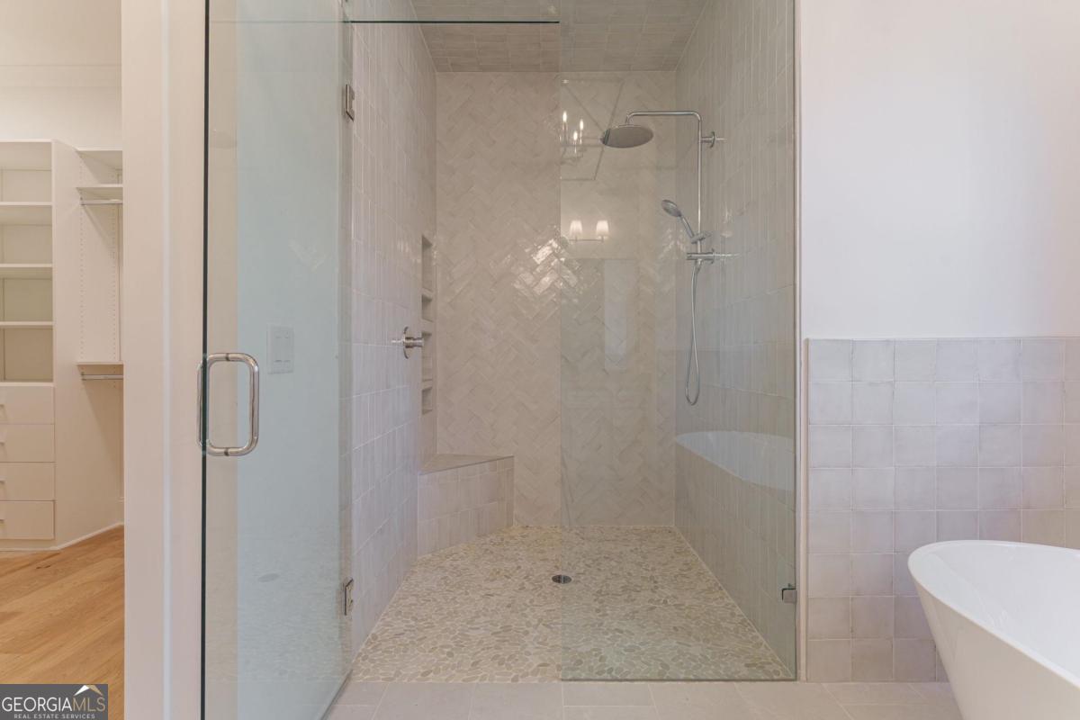 140 Parkside Lane Eatonton, GA 31024 - Photo 18 of 37 a bathroom with a shower