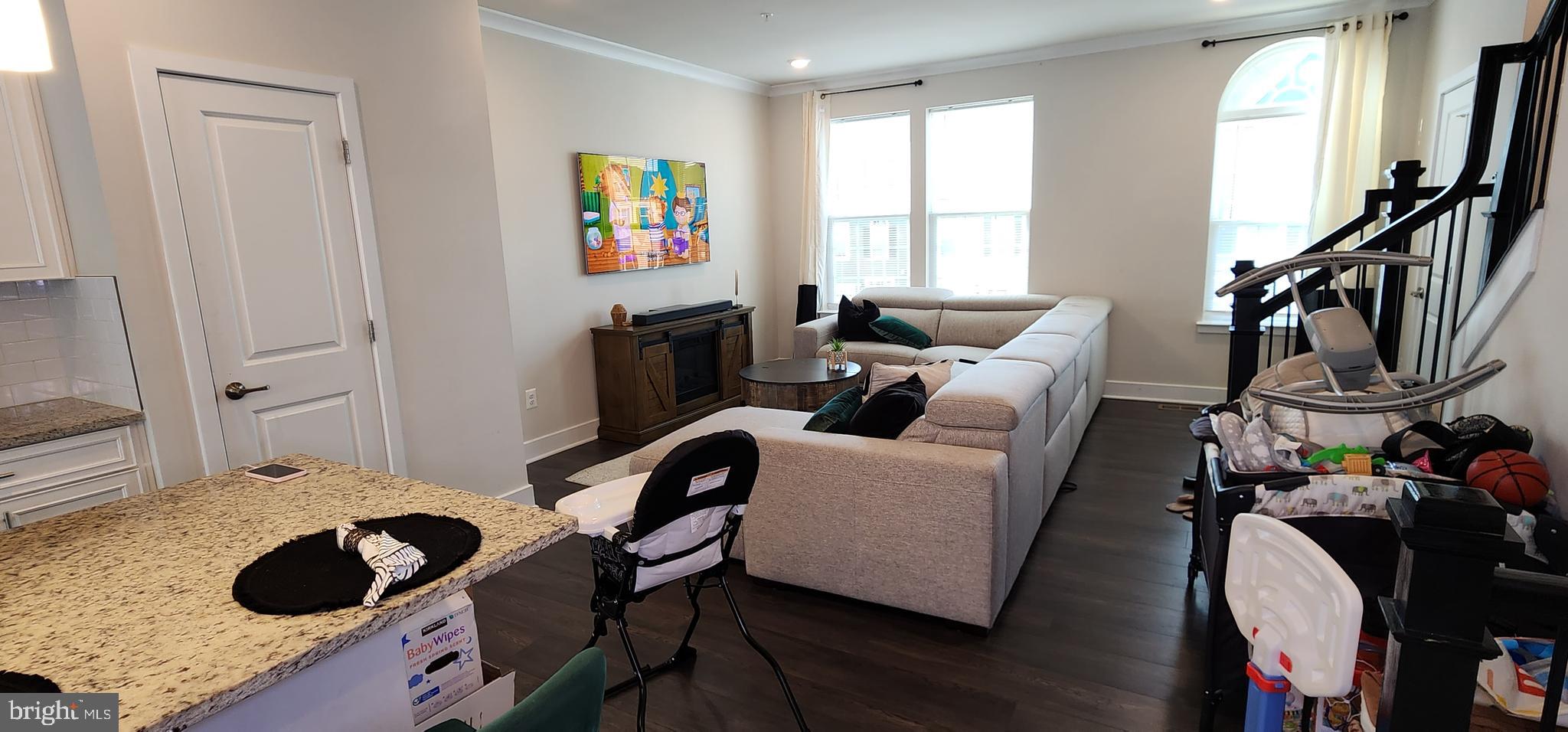 2 2nd, Unit 201 Lewes, DE 19958 - Photo 20 of 48 a living room with furniture and a window