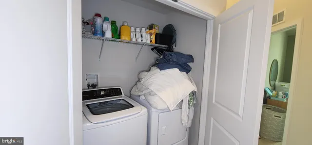 a view of a hallway with workspace