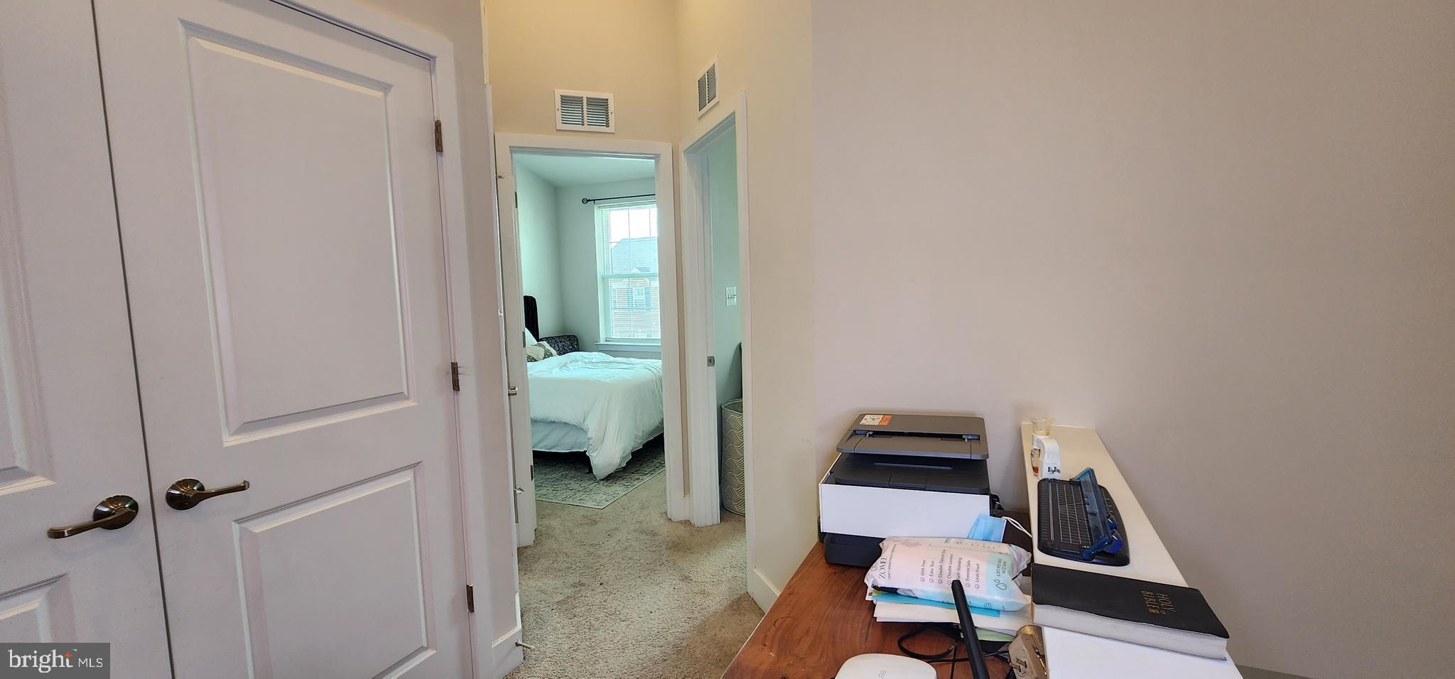 2 2nd, Unit 201 Lewes, DE 19958 - Photo 31 of 48 a view of a hallway with workspace
