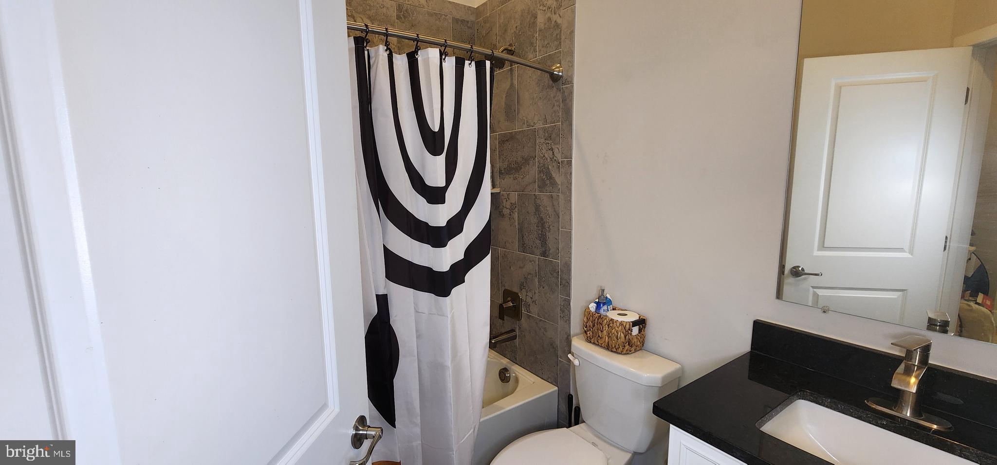 2 2nd, Unit 201 Lewes, DE 19958 - Photo 34 of 48 a utility room with dryer washer and a window