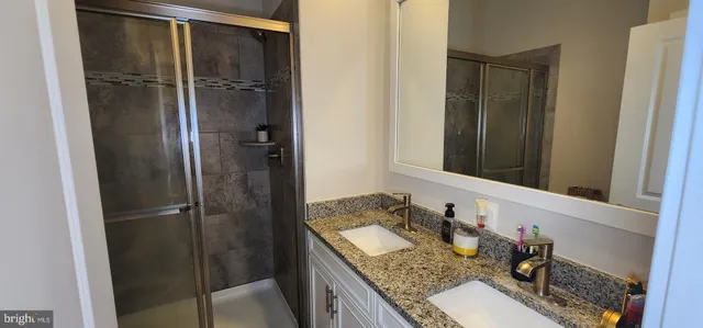 a bathroom with a tub and shower
