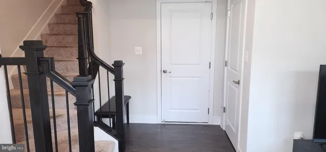 a view of an entryway with staircase