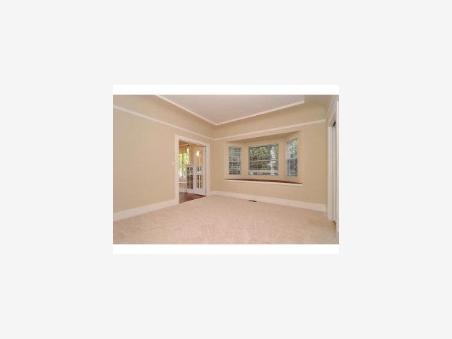 852 Prospect Row San Mateo, CA 94401 - Photo 3 of 9 a picture of a living room with a white wall