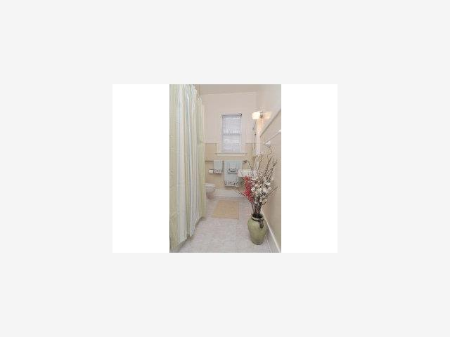 852 Prospect Row San Mateo, CA 94401 - Photo 6 of 9 a picture of a bathroom with a sink and a toilet