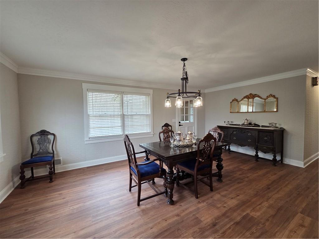 1012 Highway 332 Pendergrass, GA 30567 - Photo 19 of 51 a view of a dining room with furniture and wooden floor
