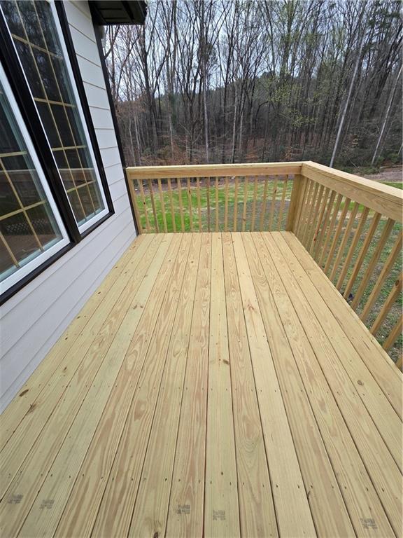 1012 Highway 332 Pendergrass, GA 30567 - Photo 24 of 51 a view of balcony with wooden floor and fence