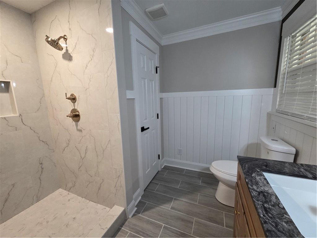 1012 Highway 332 Pendergrass, GA 30567 - Photo 34 of 51 a bathroom with a sink a toilet and shower