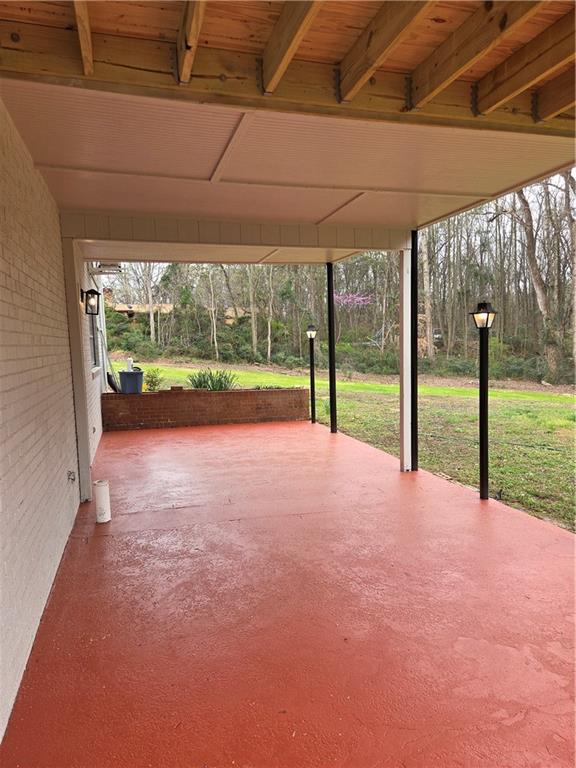 1012 Highway 332 Pendergrass, GA 30567 - Photo 50 of 51 a view of empty room with wooden floor and floor to ceiling window