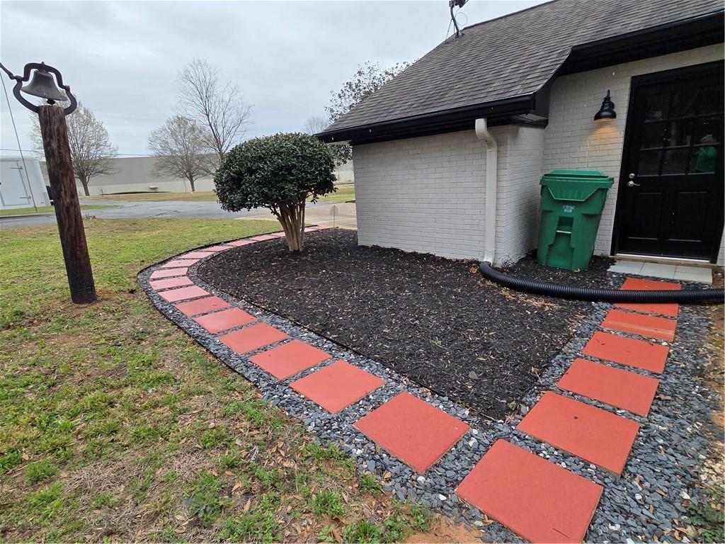 1012 Highway 332 Pendergrass, GA 30567 - Photo 6 of 51 a front view of a house with garden