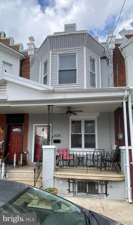 a front view of a building with retail shop
