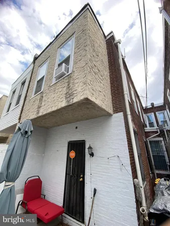 a view of a city street with cars