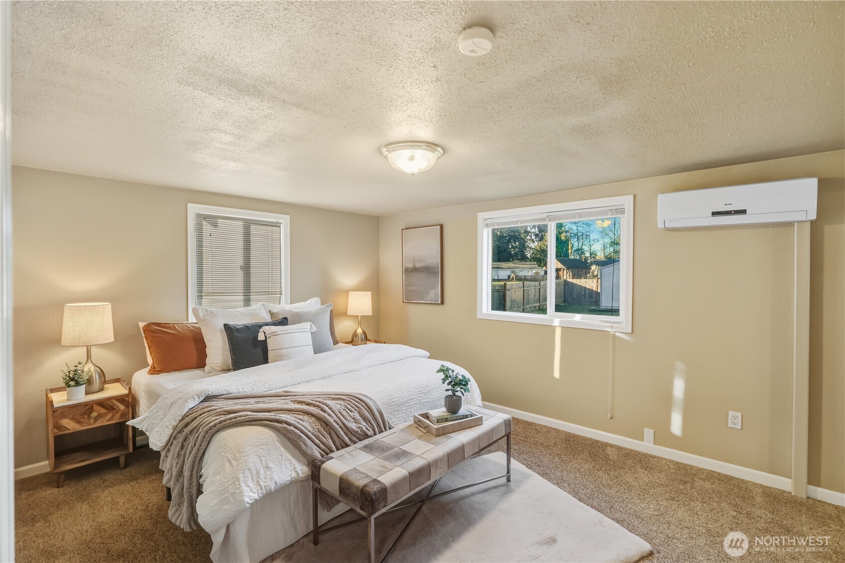 613 Hancock Street Port Townsend, WA 98368 - Photo 13 of 24 a bedroom with a large bed and a window