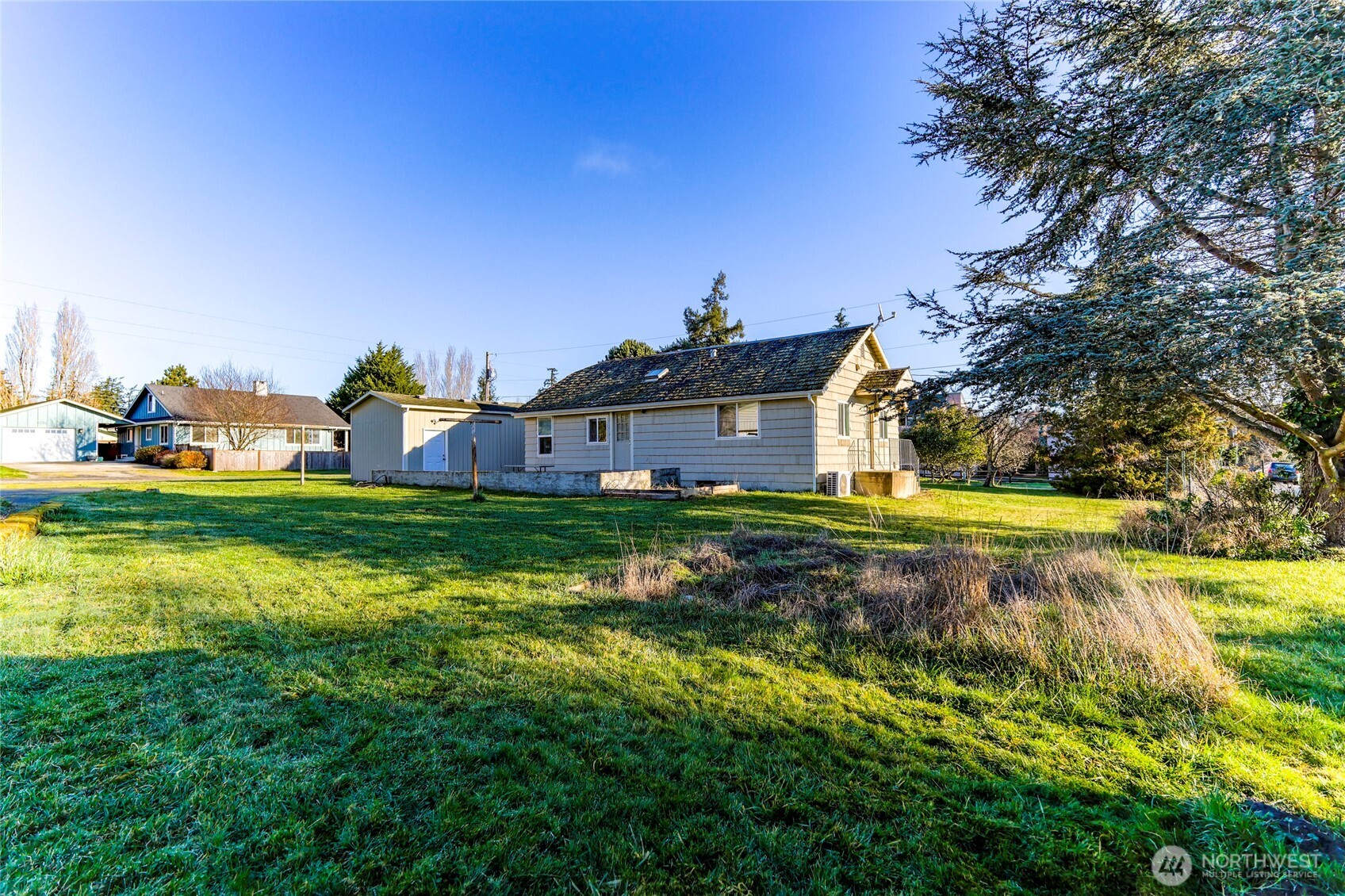 613 Hancock Street Port Townsend, WA 98368 - Photo 20 of 24 a view of a house with a big yard